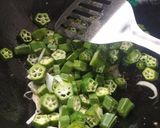 A picture of step 3 of Masaledar bhindi.