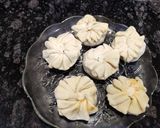 A picture of step 9 of Cheesy Paneer Potlis.