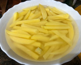 Foto del paso 9 de la receta: Cordero al ajillo con patatas fritas y champiñones rellenos