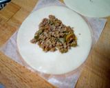 Foto del paso 4 de la receta Empanaditas redondas rellenas de carne picada