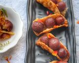 A picture of step 25 of Warm gulab jamun in sweet crunchy tacos.