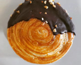 Foto del paso 18 de la receta: Espiral de hojaldre relleno de crema de melocotón y chocolate