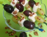 A picture of step 2 of Grinch Fruit & Cheese Kabobs (No Cook Recipe).