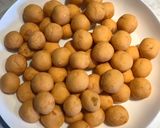 A picture of step 5 of Kolak Biji Salak - Sweet potato balls in palm sugar syrup and coconut milk.