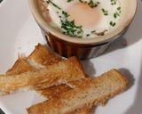 A picture of step 5 of Microwave Egg Cocotte with Bacon and Chives.