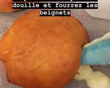 Une image de l'étape 9 de Beignets fourrés à la crèmes pâtissière et saupoudrés de pralines roses.