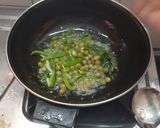 A picture of step 2 of SIMPLE and QUICK ALOO MATAR MASALA.
