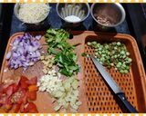 A picture of step 1 of நிலக்கடலை, கறி சுண்டல், நெல்லிக்காய் கிச்சடி.