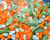 Une image de l'étape 2 de Riz aux petits légumes.