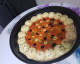 صورة لخطوة 4 من وصفة بيتزا روعة شكلا ومذاقا