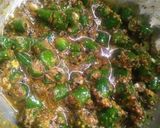 A picture of step 3 of Green chilli pickles.