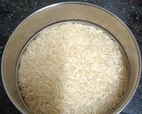 A picture of step 1 of A bowl Of Steaming Hot Basmati Rice In A Pressure Cooker.