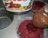 A picture of step 6 of Red Velvet çhoçolate inside Cupcakes with cream cheese frosting.