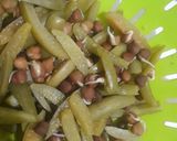 A picture of step 2 of Kadle manoli (ivy gourd with brown channa).
