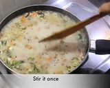 A picture of step 13 of Samak rice upma.
