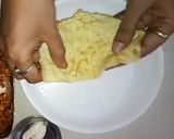 A picture of step 7 of Egg samosa with gravy.