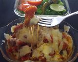 A picture of step 9 of Sweet and Sour Chicken with Cheese.