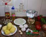 Foto del paso 1 de la receta: Patatas guisadas con chirlas y calamar