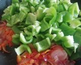 A picture of step 4 of Capsicum, Fry potato and Tomato Subji.