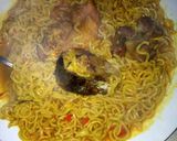 A picture of step 2 of Indomie with meat and fish.