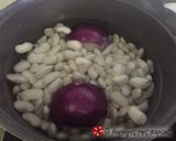 A picture of step 1 of Baked Giant Beans with Herbs and Vegetables.