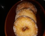 A picture of step 3 of Doughnut coated in sugar.