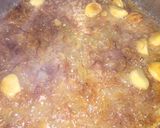 A picture of step 5 of Alu matar gravy.