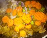 A picture of step 5 of Turmeric rice with minced meat and vegies.