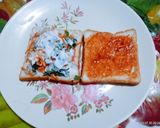 A picture of step 2 of Amul cheese spread vegetable sandwich.