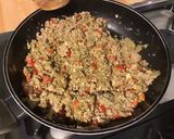 Une image de l'étape 1 de Aubergines grillées façon gâteau aux tomates, farce au chapon, pesto et emmental.