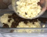 A picture of step 6 of Cheesy lamb and potatoes kupta.