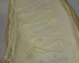 Foto del paso 8 de la receta: Enrollado o brazo de gitano con crema de naranja y chocolate