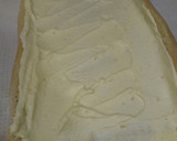 Foto del paso 8 de la receta: Enrollado o brazo de gitano con crema de naranja y chocolate