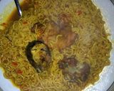 A picture of step 2 of Indomie with meat and fish.
