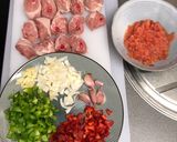 A picture of step 1 of Slow Cooker Chicken Chilindrón.