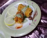 A picture of step 23 of Tandoori chicken rolls up.