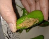 A picture of step 2 of Fried chillos 🌶🌶.