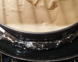 A picture of step 3 of Blackberry baked cheesecake.