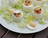 Foto del paso 7 de la receta Huevos rellenos en forma de pollito