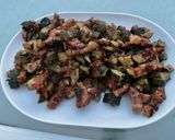 A picture of step 11 of Zucchini and Tomatoes with Bacon and Cilantro.