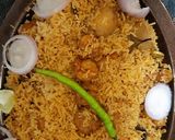 A picture of step 4 of Jhinga Pulao.
