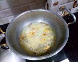 A picture of step 4 of Masala French fries.