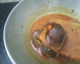 A picture of step 4 of Baigan Tomato Curry.