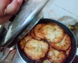 A picture of step 2 of Malpura with rabri.