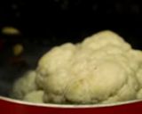 A picture of step 2 of Gobhi musallam.