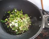 A picture of step 3 of Hariyali pulav.