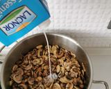 A picture of step 2 of Creamy Mushroom soup, drizzle truffle oil, rustic croutons.