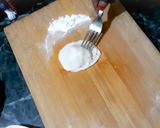 A picture of step 10 of Italian panner ravioli with pink sauce.