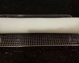 A picture of step 15 of Chocolate Strawberry Ice Cream Cake Roll.