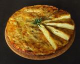 Foto del passaggio 11 della ricetta Tortino di patate al forno con timo rosmarino e noce moscata